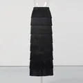 Detailed view of black tiered fringe high waist maxi skirt with elegant flowing layers - M / Bottoms / Black