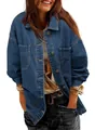 Close-up of oversized blue denim jacket with button-down front and front pockets. - S / Tops / Blue