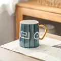 Minimalist Japanese ceramic coffee mug with unique hand-painted patterns and yellow handle - Blue-Green Spiral (Single Cup) / Single Cup