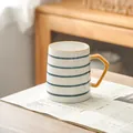 Minimalist white ceramic breakfast mug with blue stripes and stylish amber handle. - White Blue Horizontal Stripes (Single Cup) / Single Cup