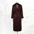 Elegant burgundy mid-length trench coat with lapel and belt on mannequin - S / Tops / Brown