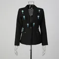 Detail shot of black blazer with elegant blue teardrop rhinestone embellishments - S / Tops / Black