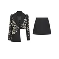 Elegant black two-piece set featuring a pearl-beaded asymmetric blazer and mini skirt - S / Top And Bottom / Black and White