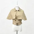 Detail view of khaki cropped vest with detachable cape cloak and adjustable waist belt - S / Tops / Khaki