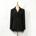 Detailed front view of black blazer with ostrich feather and shell patchwork. - M / Tops / Black
