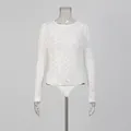 Front view of a white floral lace long-sleeve bodysuit on a transparent mannequin - S / Tops / White