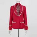 Close-up of elegant red blazer with shimmering rhinestone trim and feather cuffs - M / Tops / Red