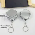Portable round metal pill box keychain with 5cm diameter and 1.7cm thickness. - Round Single Grid Silver with Keychain / 5cm Single Grid Pill Box with Keychain