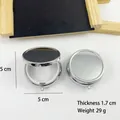 Detailed top view of round metal pill boxes with dimensions of 5cm and 1.7cm thickness. - Round Single Grid Silver / 5cm Single Grid Pill Box