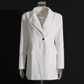 Detailed view of white long-sleeved blazer dress featuring a stylish cinched waist - S / Dresses / White