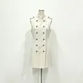 Front view of apricot sleeveless stand collar A-line dress with military-style buttons - S / Dresses / Apricot