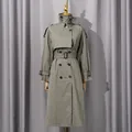 Elegant olive green British style mid-length trench coat for women with waist belt - XS / Tops / Gray