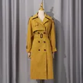 Elegant mustard yellow French style trench coat with double-breasted buttons and belt. - XS / Tops / Yellow
