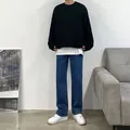 Men's straight-leg blue jeans in a casual street style outfit with white sneakers. - 28 / Bottoms / Dark Blue