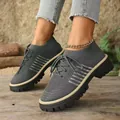 Detailed view of grey breathable fly-knit casual shoes with comfortable platform soles - 36 / Dark Gray