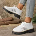 Comfortable white flying knit sneakers featuring thick black lug sole for casual wear - 36 / White