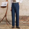 Men's classic straight-leg dark blue denim jeans in a vintage rustic room setting - 28 / Bottoms / Dark Blue