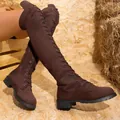 Close-up view of brown lace-up over-the-knee boots featuring a rustic wooden background setting - 35 / Coffee