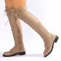 Side view of stylish beige lace-up thigh-high boots with a comfortable low block heel - 35 / Khaki