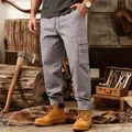 Vista dettagliata dei pantaloni cargo grigi larghi multitasche in uno stile vintage workwear - Taglia S / Pantaloni e gonne / Grigio