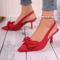 Elegant red pointed-toe slingback high-heel pumps featuring a stylish large bow on the toe. - 35 / Red