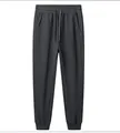 Donkergrijze joggingbroek voor heren van katoen met verstelbare trekkoord in taille - M / Bottoms / IJzergrijs