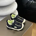 Close-up of breathable blue and lime mesh sneakers for kids with adjustable velcro strap - 23 / Blue