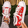 Festive Christmas red canvas sneakers featuring Santa Claus and reindeer holiday print. - 36 / Low-top Lace-up Style / Red