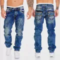 Detailed view of distressed blue straight-leg jeans with hip-hop pocket embroidery - S / Bottoms / Dark Blue