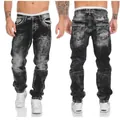 Detailed view of men's distressed black straight-leg denim jeans with pocket design - S / Bottoms / Dark Gray