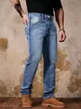 Jeans in denim elasticizzato celeste da uomo con ricami eleganti e stile casual chic. - Taglia S / Pantaloni e gonne / Azzurro