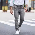 Jeans in denim grigio slim fit da uomo con speciali tasche decorative ricamate a mano - Taglia S / Pantaloni e gonne / Grigio chiaro