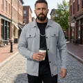 Male model in a grey casual work jacket walking on an urban cobblestone street. - S / Tops / Gray