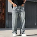 Men's loose straight light blue denim jeans with sparkling rhinestone studded details - 38 / Bottoms / With Chain / Light Blue