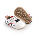 Close-up of white baby prewalker shoes with red and navy stripes and soft sole - 11cm / Blue