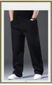 Comfortable plus size men's loose straight-leg stretch denim jeans in black finish - 28 / Bottoms / Black