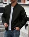 Close-up of men's waffle knit jacket showing texture and sleeve zipper detail - S / Tops / Black