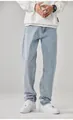 Detailed studio shot of men's loose light blue straight-leg denim jeans for casual wear - S / Bottoms / Light Blue