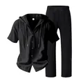 Detail view of men's black linen-style hooded shirt and matching straight-leg trousers - S / Top And Bottom / Black