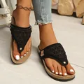 Detailed close-up view of stylish black hollow-out thong sandals for women beach wear - 36 / Black