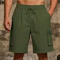 Close-up of olive green outdoor cargo shorts with drawstring waist and side pocket. - S / Bottoms / Army Green