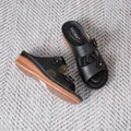 Elegant black women's wedge sandals with laser-cut floral patterns and flower accents - 38 / Black