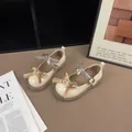 Close-up of vintage-style Mary Jane shoes featuring elegant bows and pearl accents - 26 / Vintage Bowknot Style (V1861011) / Beige