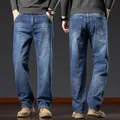 Men's loose straight leg jeans in deep blue denim fabric shown in front and back views - 28 / Bottoms / Blue