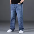 Detail view of men's loose straight-leg blue denim jeans for casual autumn outfits - 29 / Bottoms / Light Blue