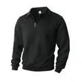 Men's solid black half-zip polo shirt with textured cable knit jacquard pattern. - Black