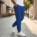 Pantalones cargo azules para hombre con múltiples bolsillos y cintura con cordón - Azul