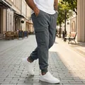 Men's fleece lined cargo sweatpants in dark grey with drawstring waist and pockets - S / Bottoms / Gray