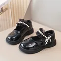Elegant girls' black patent leather Mary Jane shoes with pearl and ruffle detailing - 26 / Black