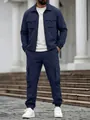 Detail view of men's navy blue cargo jacket and pants set in urban outdoor setting - S / Top And Bottom / Navy Blue